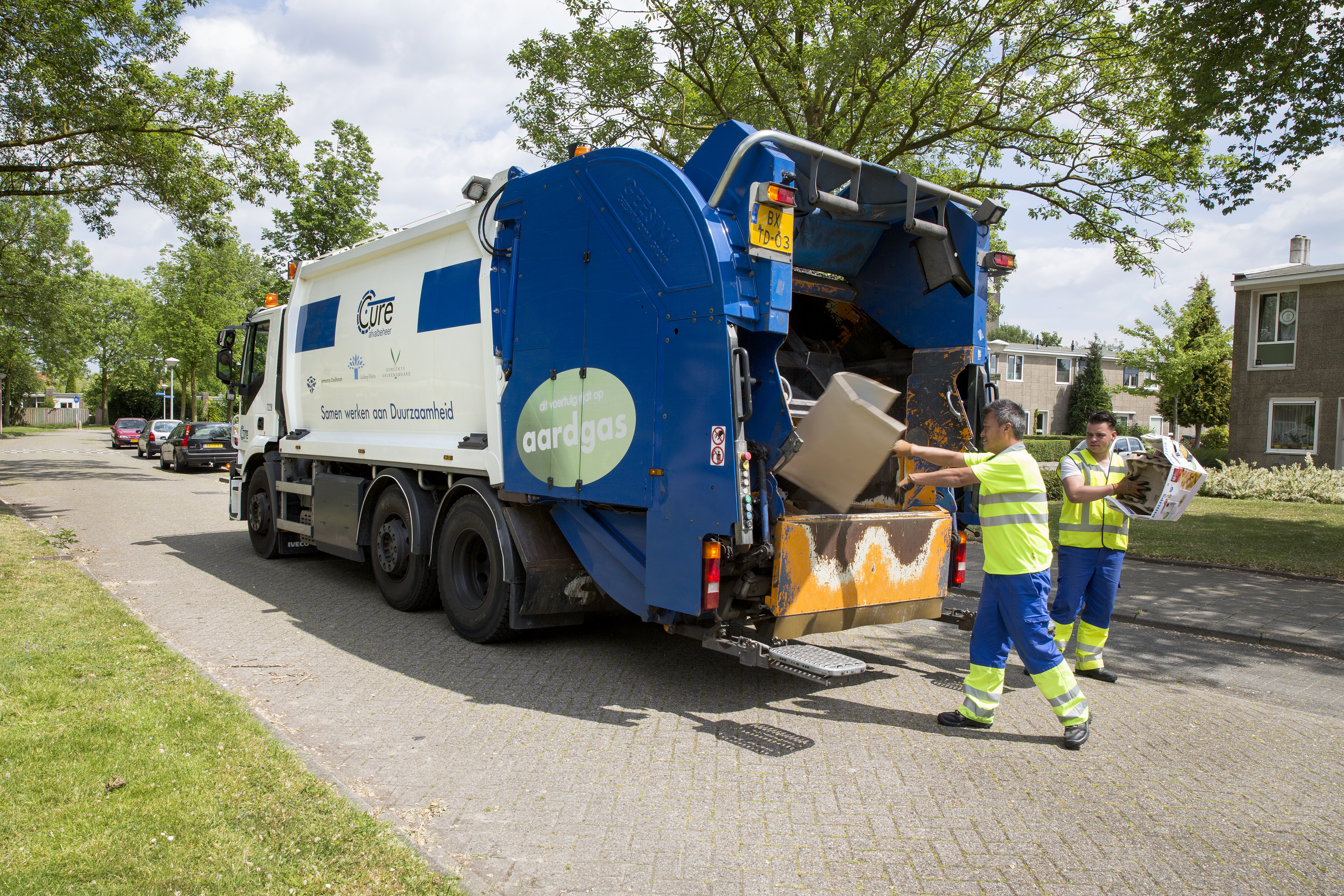 Garbage truck with two garbage collectors